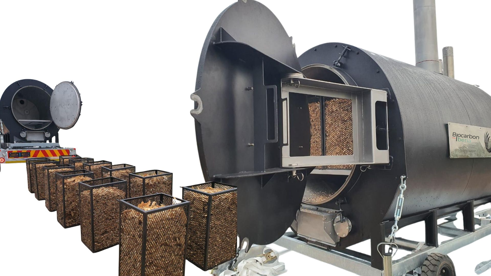 A trailer-mounted mobile pyrolysis kiln by Biocarbon Iberia with its door open, alongside mesh baskets of biomass feedstock